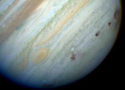 Jupiter following the impacts. The dark patches caused by the impacts are almost Earth sized.